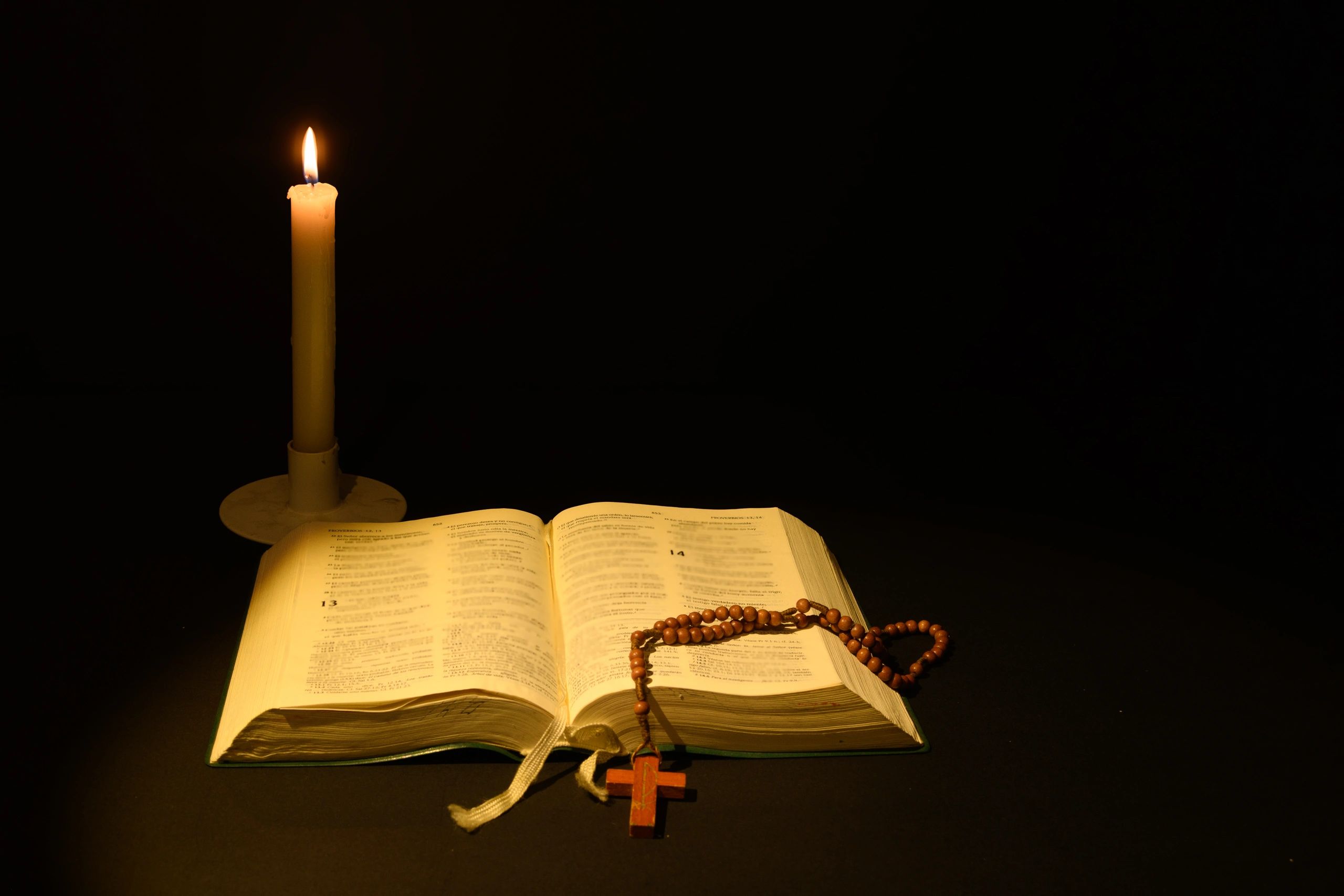 Peaceful prayer setting with soft candlelight and a hopeful new day